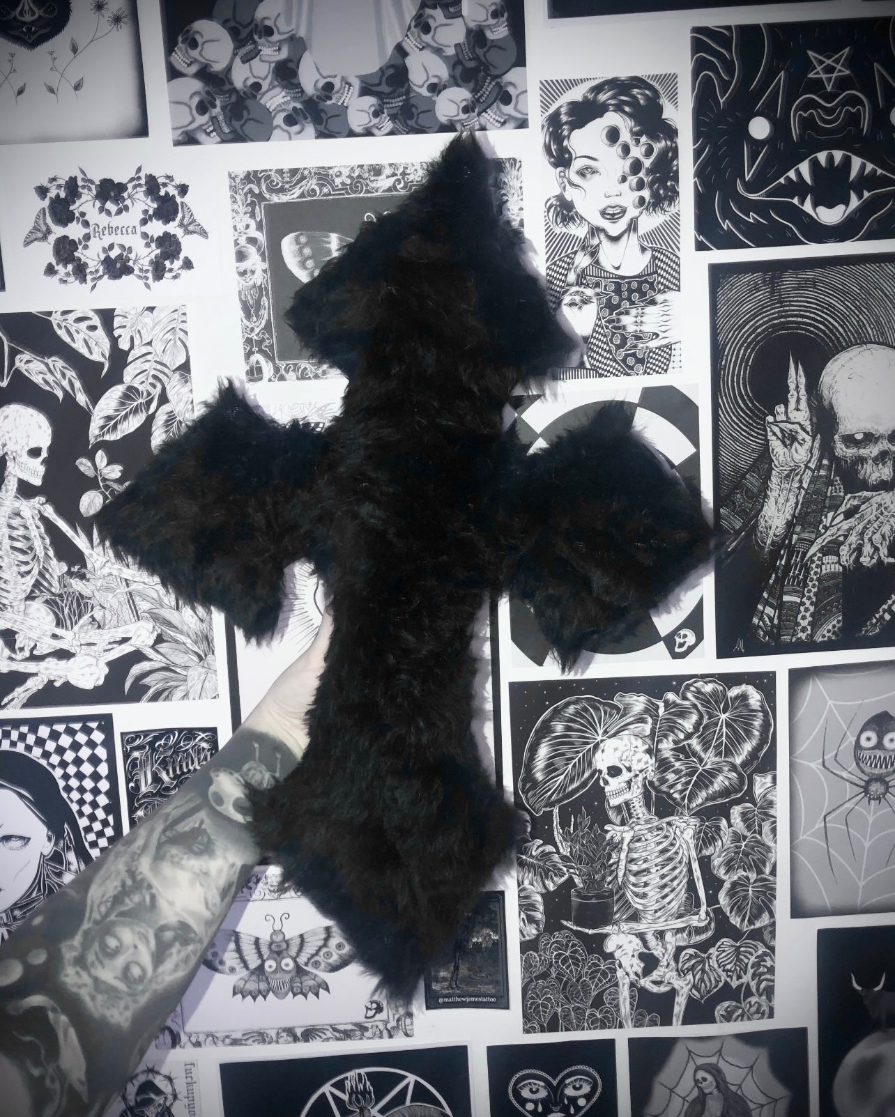 Faux furr black cross cushion